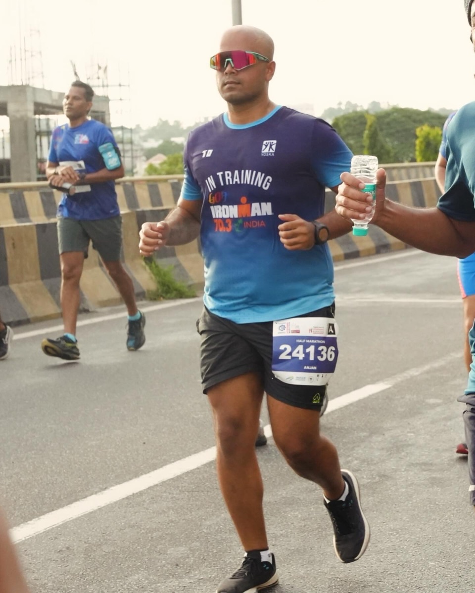 Anjan running NMDC Hyderabad Half Marathon 2024